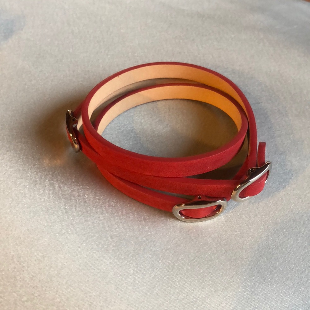 Red leather bracelet with silver buckles